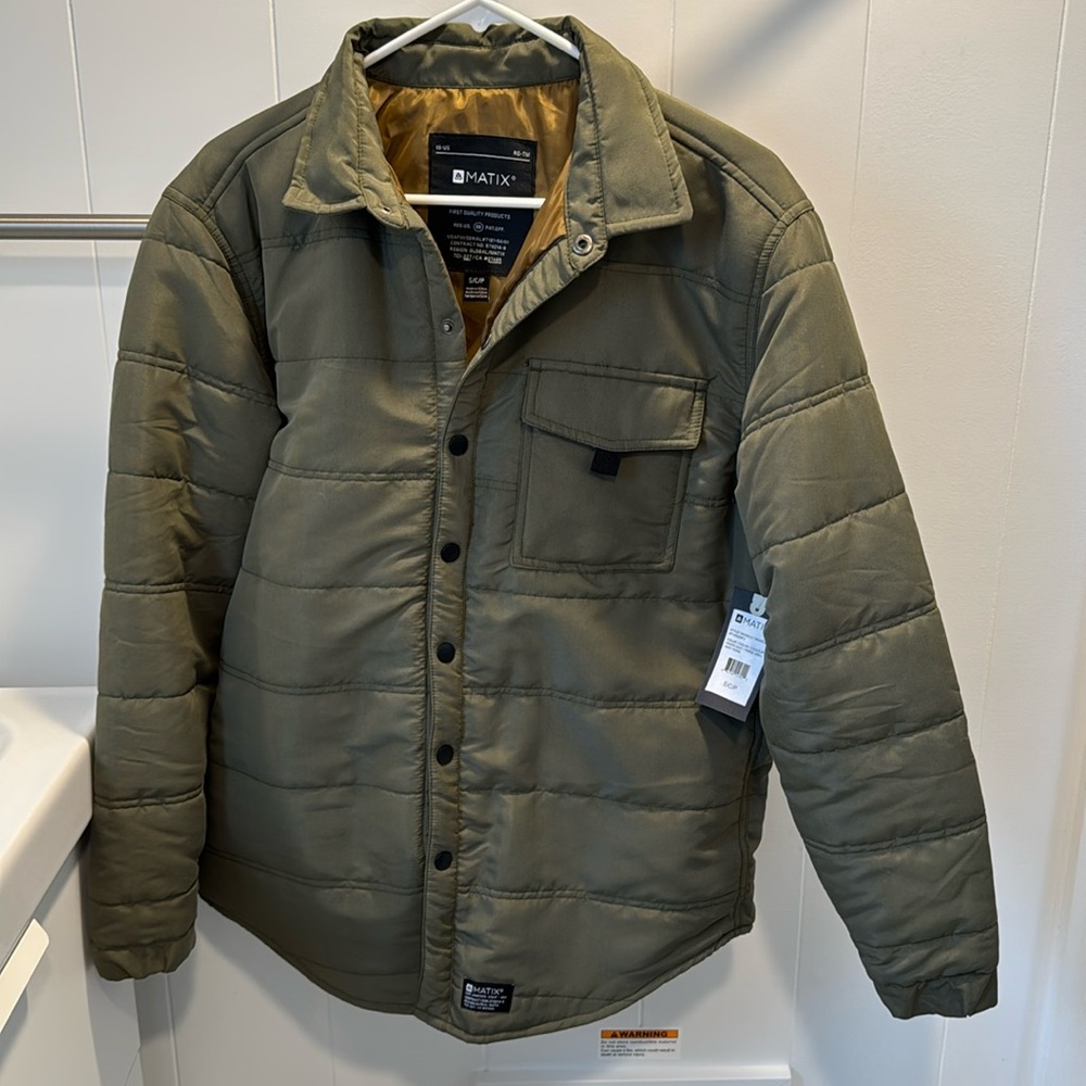 Matix Solid Nylon Jacket 
Size: Men’s Small
Colour: Grape Leaf (Green)